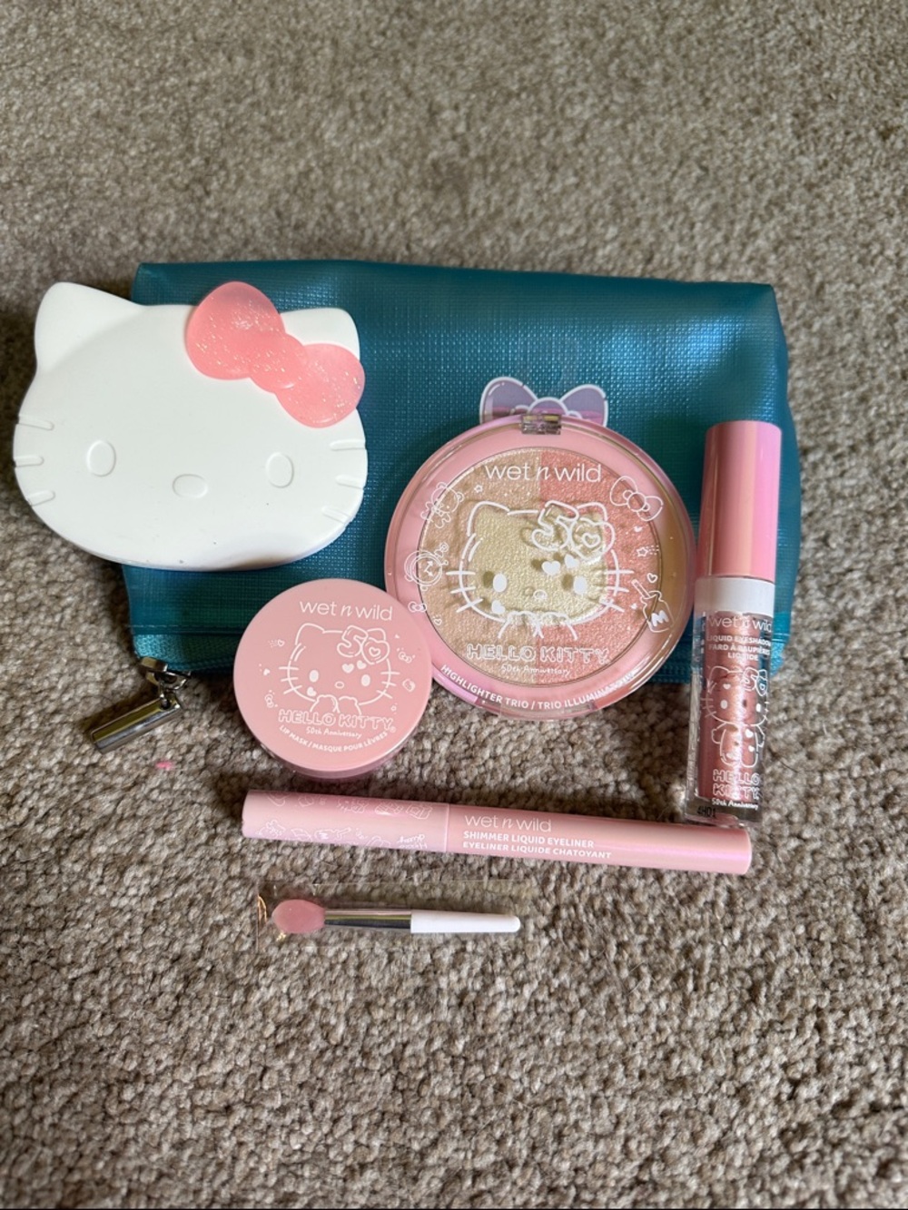 7 piece wet n wild Hello Kitty Pink Makeup Set with Teal Pouch
